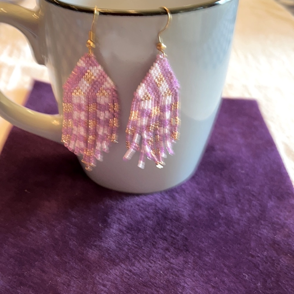 Hand made fringe earrings.